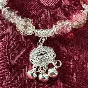 Elegant Pink Beaded Bracelet with Silver Charm